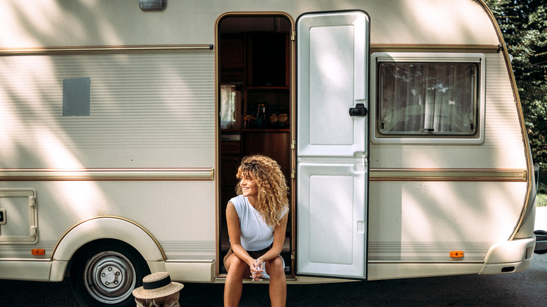 woman and rv traveling
