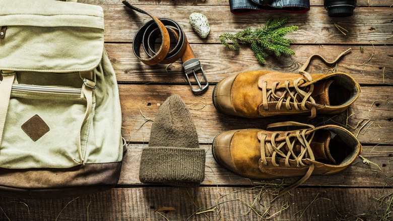 hiking accessories around backpack