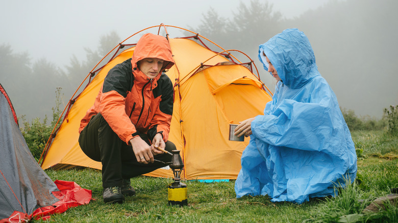 couple making coffee in fog