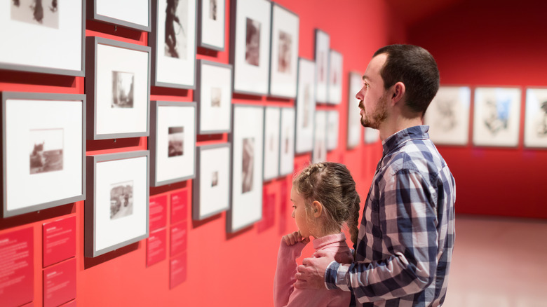 father and daughter at gallery