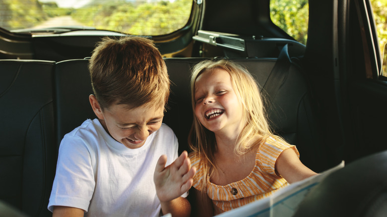 Laughing kids in backseat