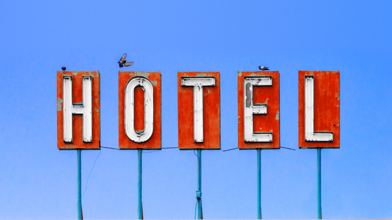 old red hotel sign