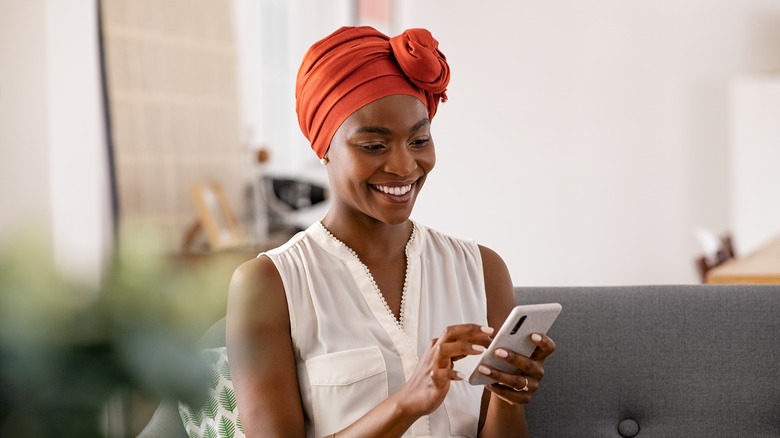 woman on the phone smiling