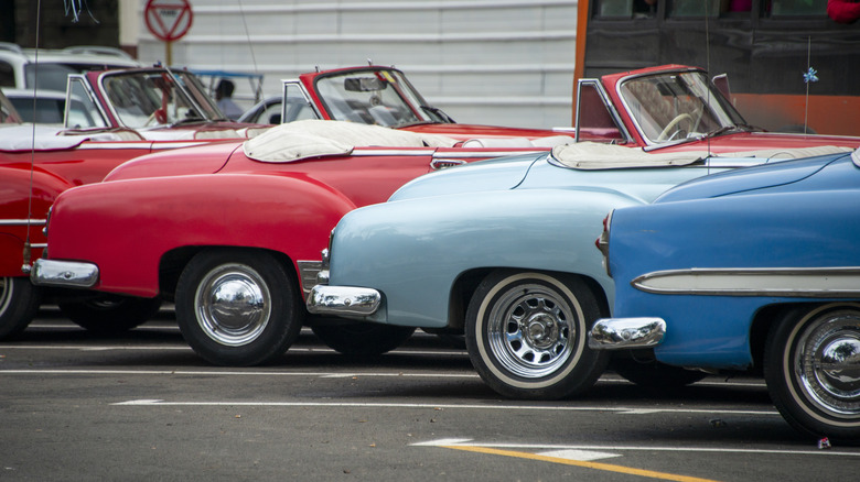 brightly colored 1960s cars