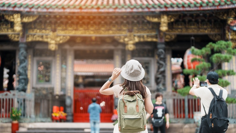 Woman looking at a temple