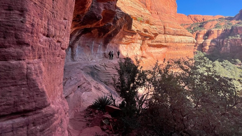 Hikers on cliff in Sedona, Arizona