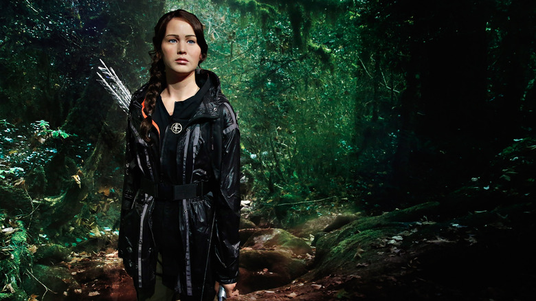 Wax figure of Katniss in the forest