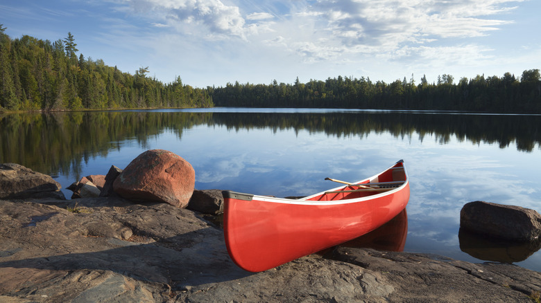 Canoe on shore boundary waters