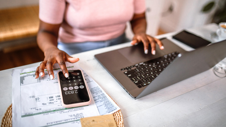 woman doing her budget