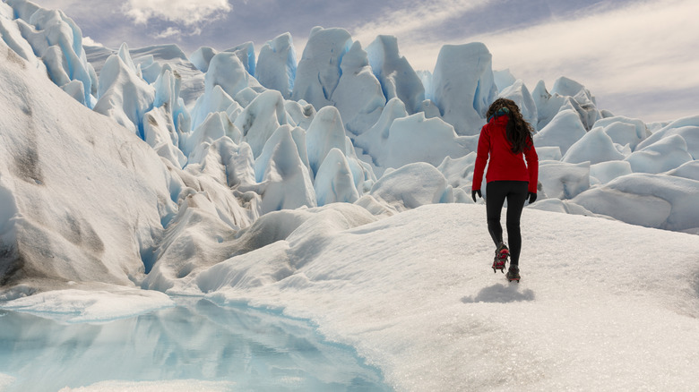 Hiker surrounded by glaciers