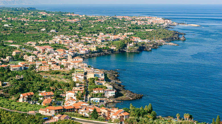 Aerial view of towns along the eastern coast of Sicily, near Acireale