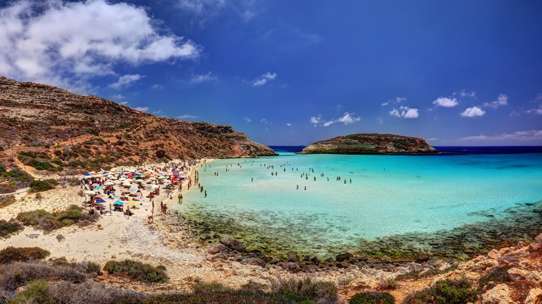 beach, bluffs, and turquoise water