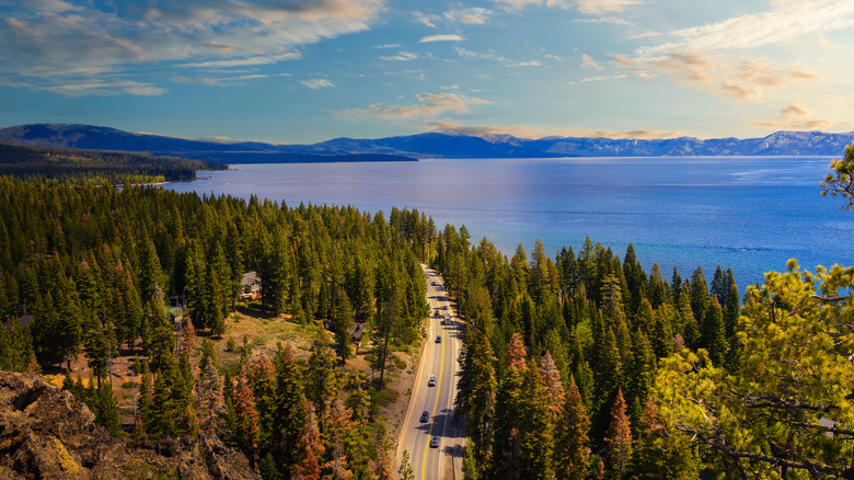 sunset view of Lake Tahoe and nearby road, California