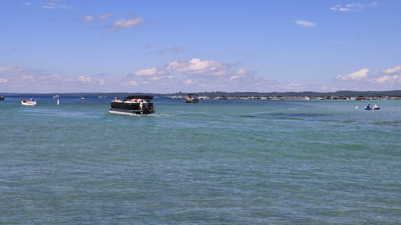 Cruise ships in blue water at Torch Lake, Michigan