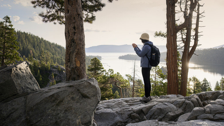 Woman uses cellphone at Tahoe