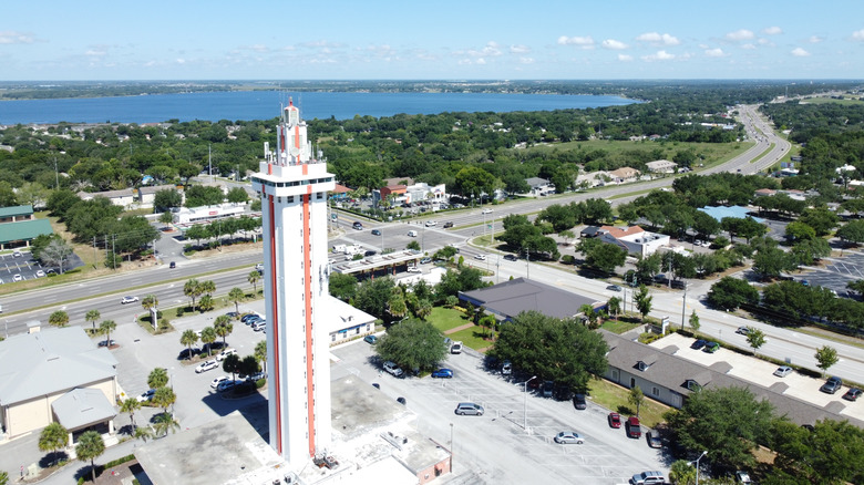 Tower in front of a lake town
