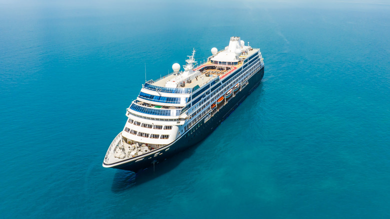 Big cruise ship at open sea tropical blue waters