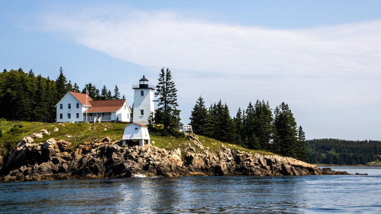 A a lighthouse on an island in Maine