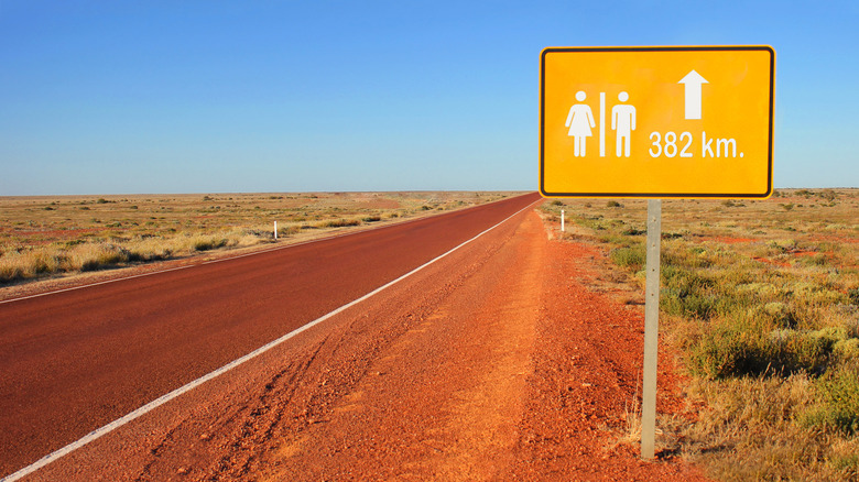 Bathroom sign on a highway