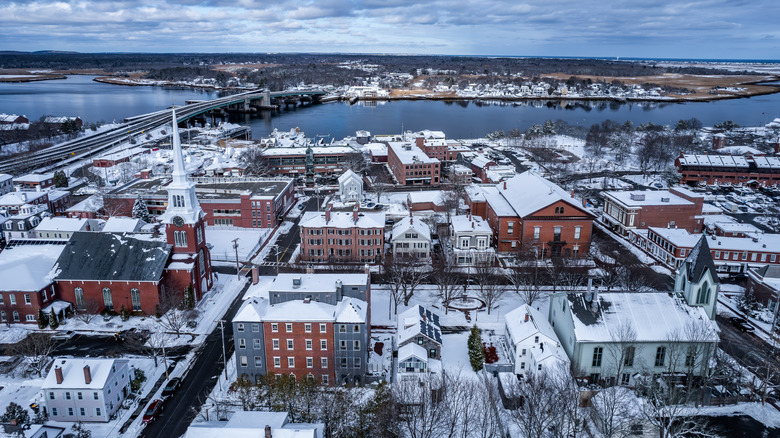 An aerial view of Newburyport covered in snow with the Merrimack River behind