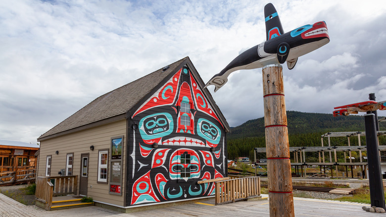 Some Indigenous wall art and totems found in the town of Carcross
