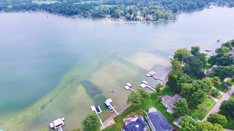 An aerial view of homes and boat docks in Coldwater, a lakeside city in southern Michigan