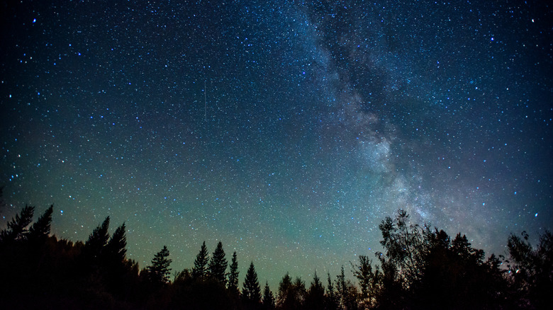 a star studded night sky with a clear view of the MilkyWay