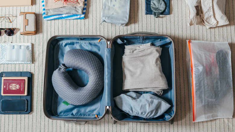 Organizing a suitcase while packing