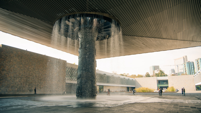 Water falls from the central column of the inner courtyard of the National Museum of Anthropology