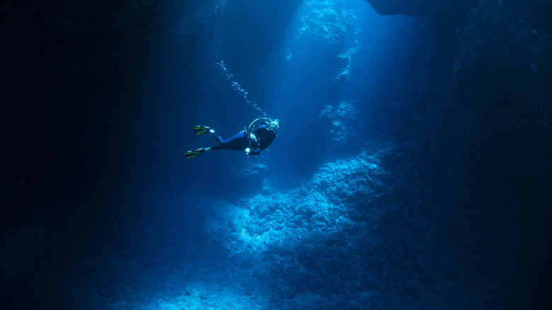 Scuba diver in cave