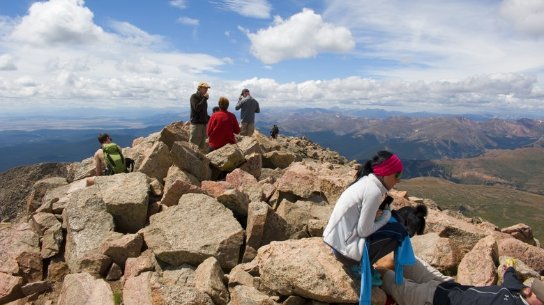 Hikers and scenery on the trail up to the summit of 14,065 foot Mount Bierstadt near Guanella Pass Road south of Georgetown Colorado.