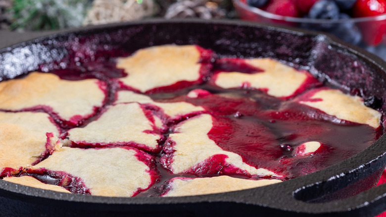 Berry crisp cooking in a skillet