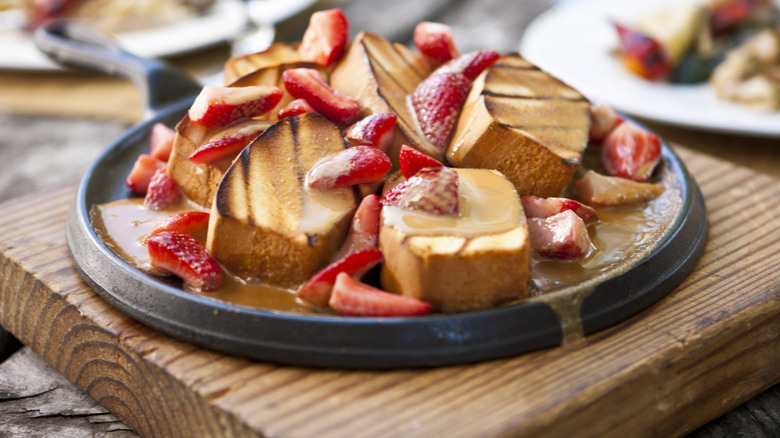 Grilled pound cake topped with tres leches sauce