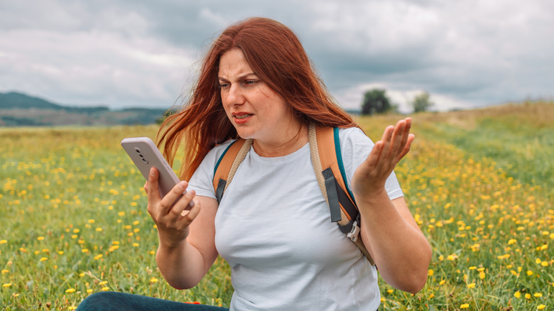 An angry hiker with no phone signal.