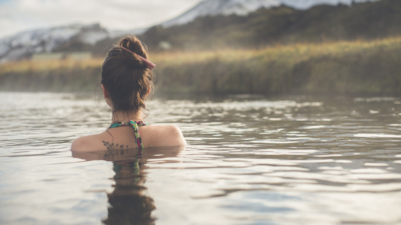 Beautiful girl in a hot spring