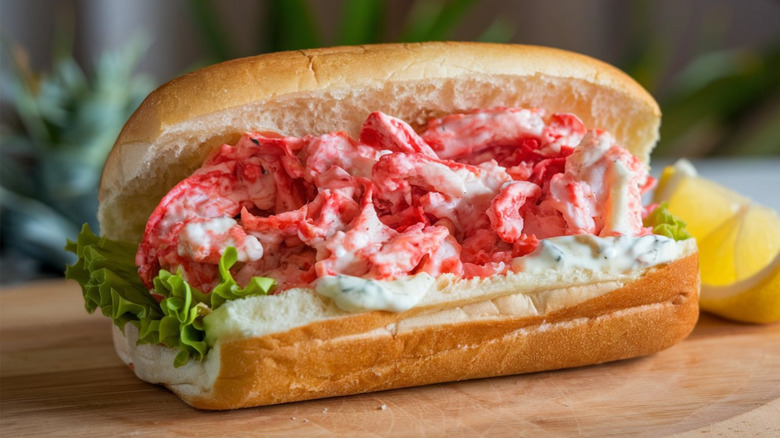 A lobster roll sits on a table