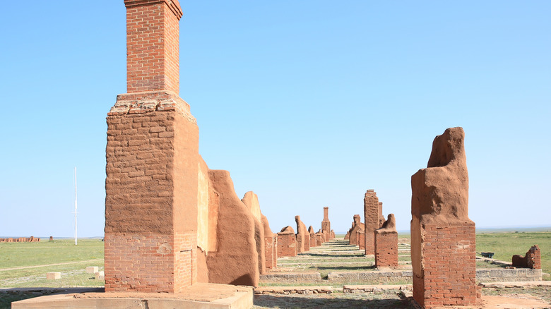Crumbling red brick structures at Fort Union