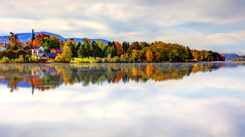 Tupper Lake's fall foliage reflected in the water