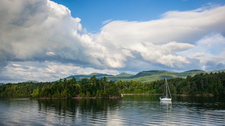 A sailboat and mountain view on Lake Champlain
