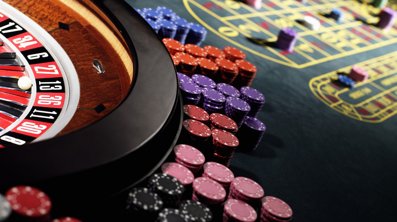 Close up of roulette wheel and chips