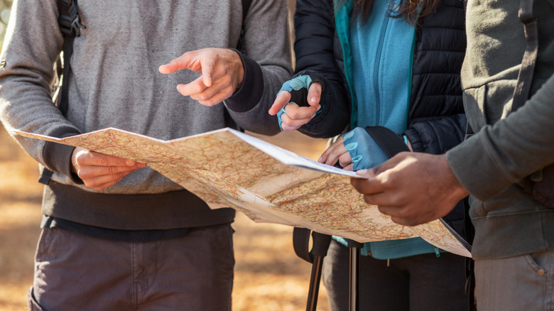 friends looking at a map