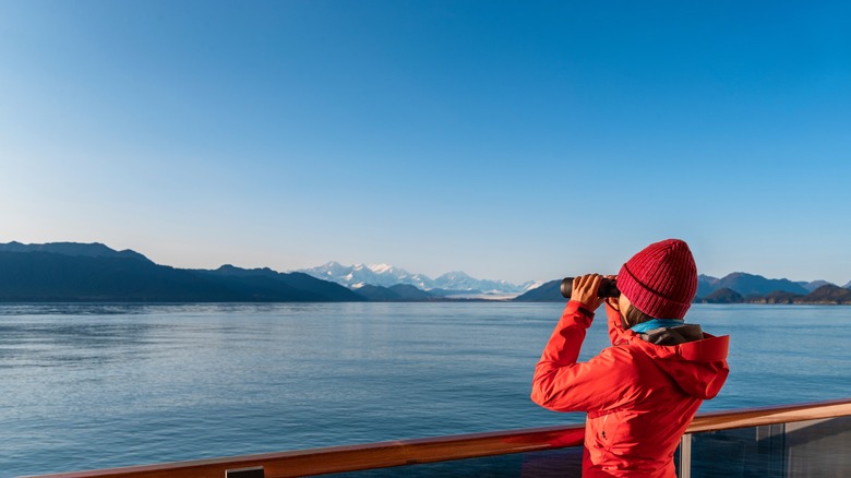 Women on ship with binoculars