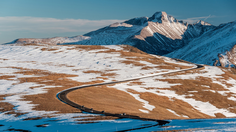 Trail Ridge Road winding through snowy alpine tundra in Rocky Mountain National Park