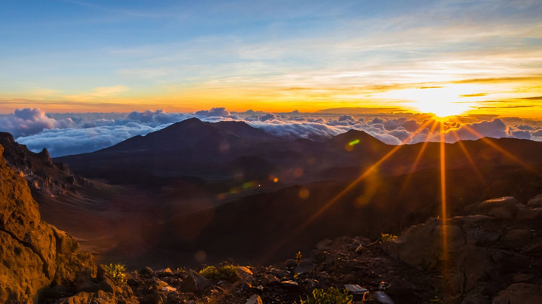 Sunrise over the clouds from the summit of Haleakalā volcano