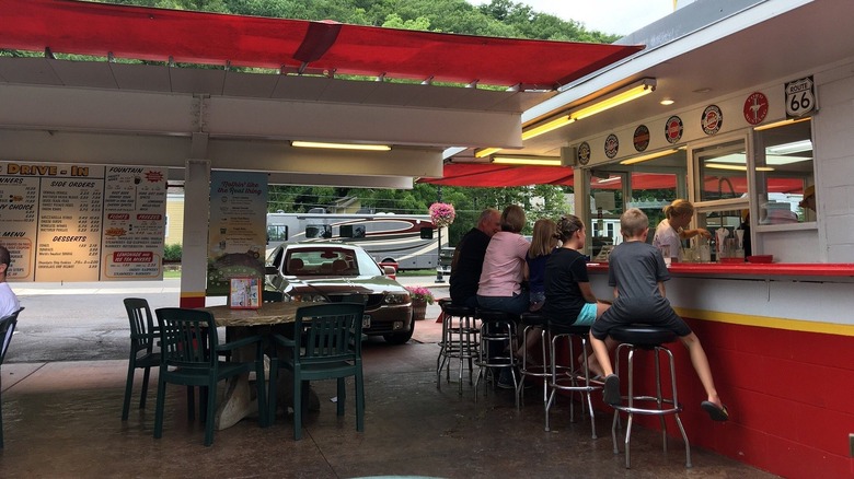 People eating at The Drive-In