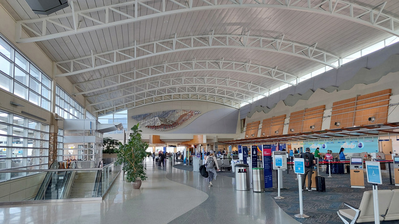Inside a bright airport terminal