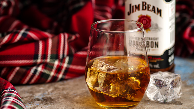 glass of bourbon with ice