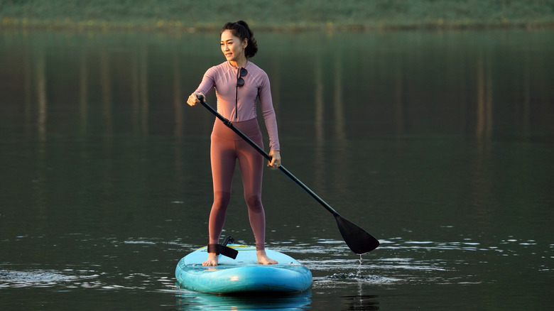 woman paddleboarding