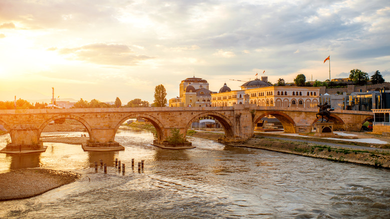 stone arched bridge at sunset