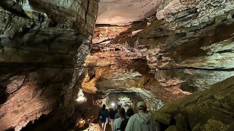Tourists walk down into the interior of Wyandotte Cave.